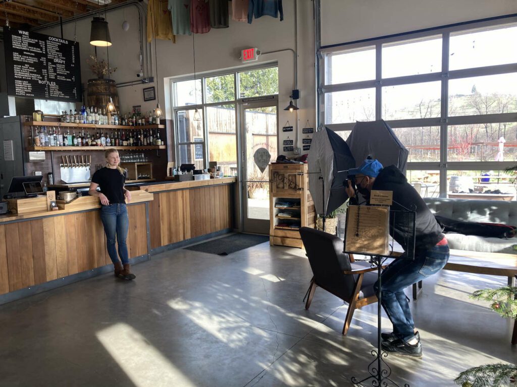 Photographer, taking a photo of a local business in Phoenix, Oregon